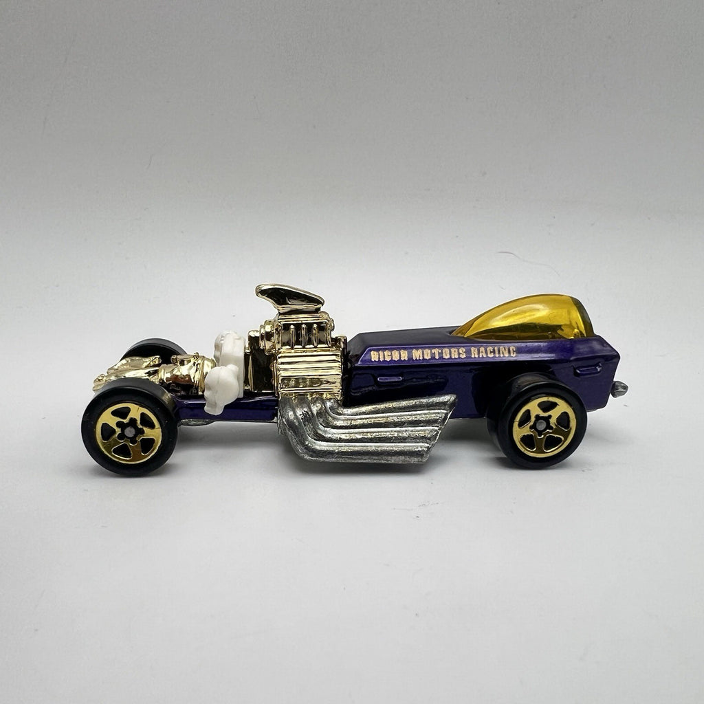 Vtg. 1994 Hot Wheels  Rigor Motor Racing Car Purple Gold 1:64 Die-cast