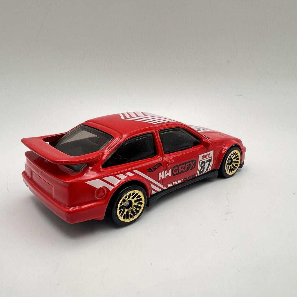 2022 HOT WHEELS '87 FORD SIERRA COSWORTH #87 RED DIECAST 2 7/8" RACE CAR W WHITE