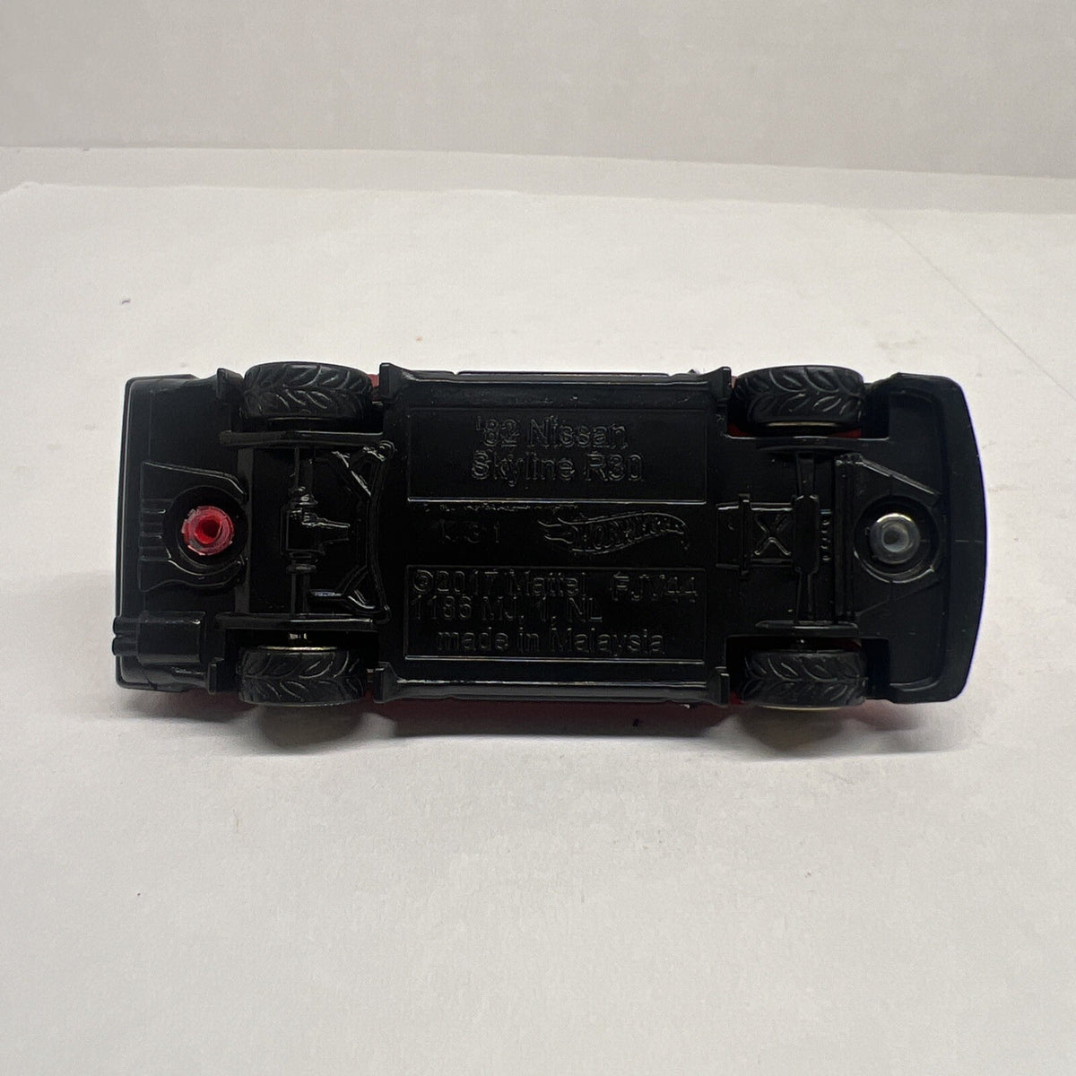 Hot Wheels 1:64 Red 1982 NISSAN SKYLINE R30 Custom with Real Riders