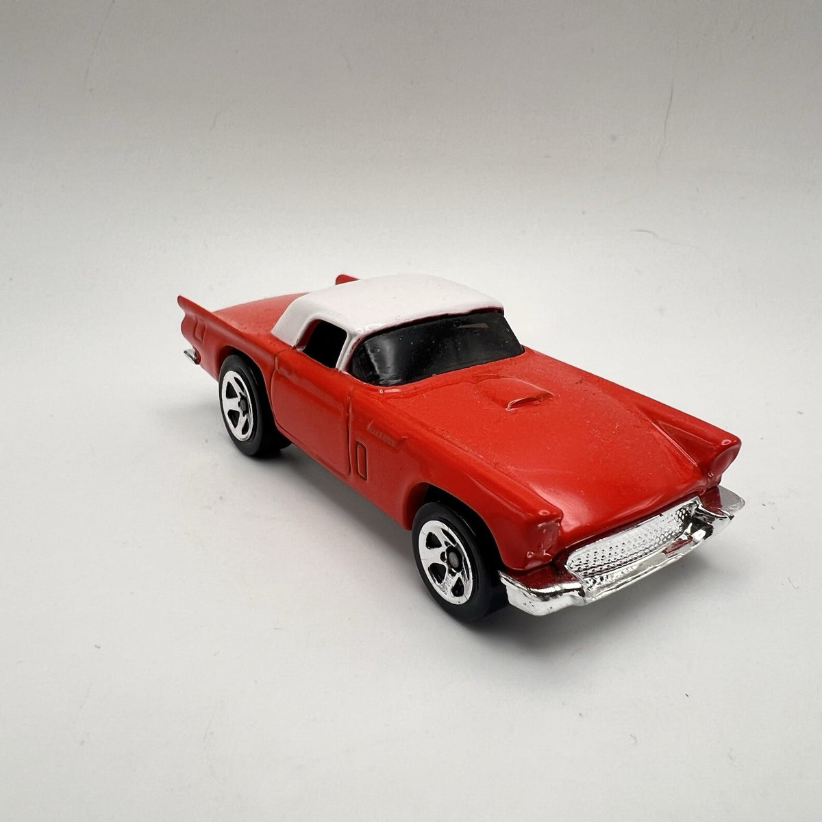 hot wheels 57 thunderbird In Orange With White Top.