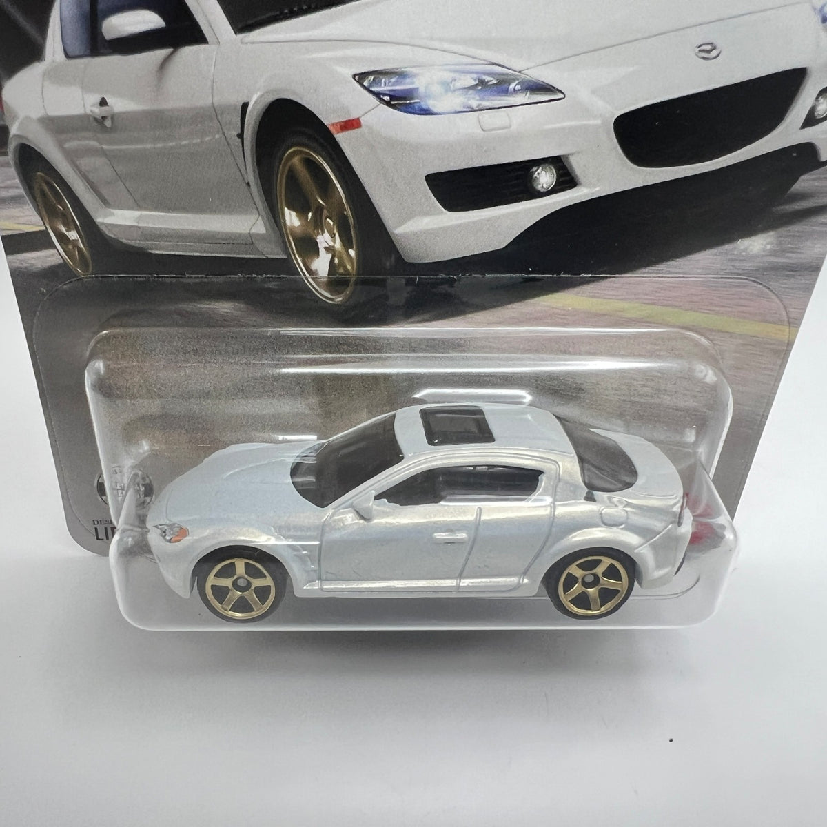 Matchbox 2004 Mazda RX-8 19/125 Silver White Gold Wheels 1:64 Diecast
