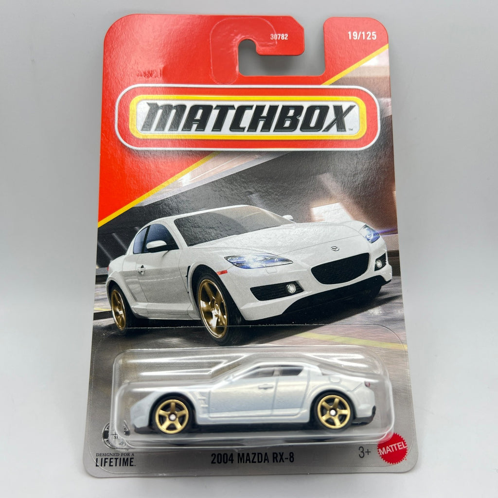 Matchbox 2004 Mazda RX-8 19/125 Silver White Gold Wheels 1:64 Diecast