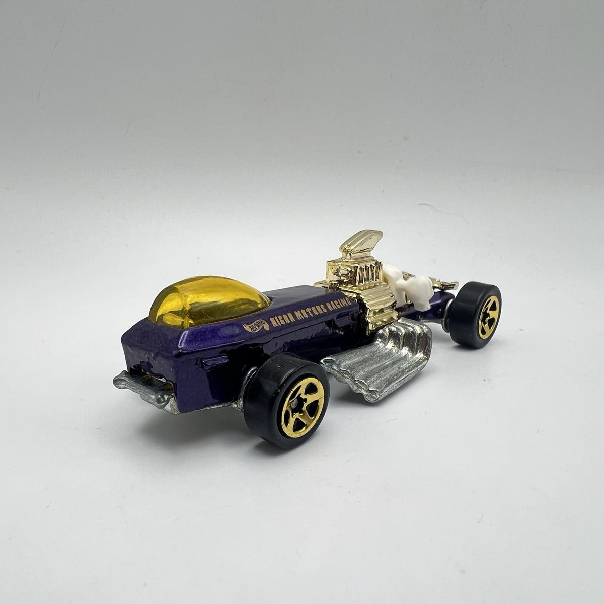 Vtg. 1994 Hot Wheels  Rigor Motor Racing Car Purple Gold 1:64 Die-cast