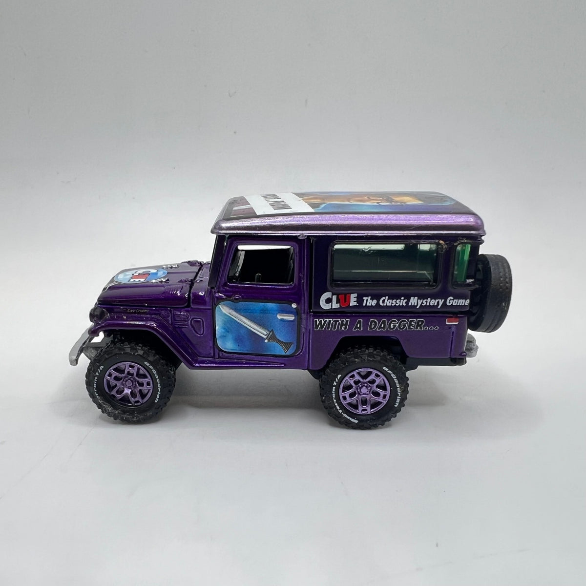 Johnny Lightning Clue Toyota Land Cruiser FJ40 Prof Plum Purple LOOSE 1/64