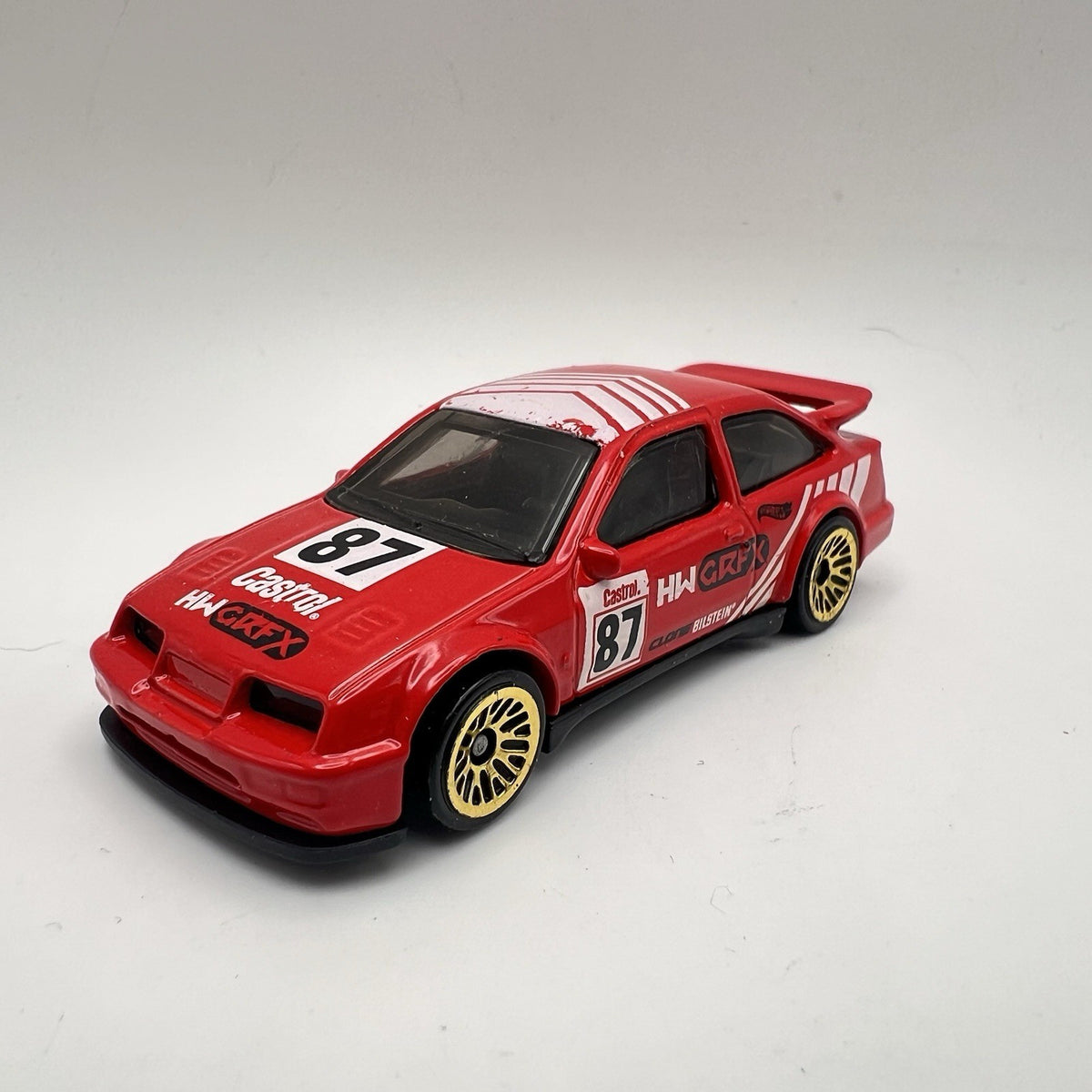 2022 HOT WHEELS '87 FORD SIERRA COSWORTH #87 RED DIECAST 2 7/8" RACE CAR W WHITE