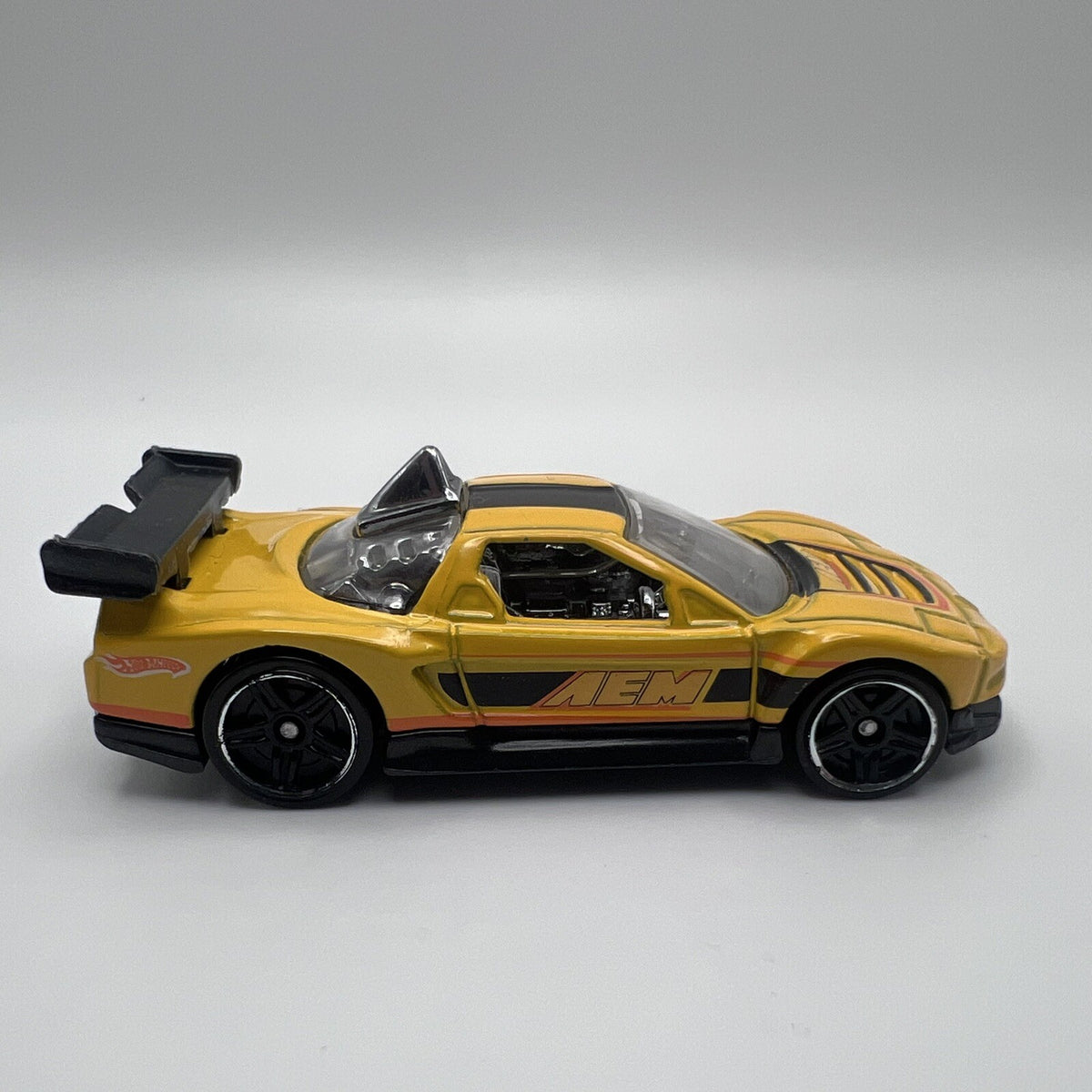 2010 HOT WHEELS ACURA NSX AEM YELLOW 1:64 DIECAST 2 7/8" CAR W/ ORANGE & BLACK