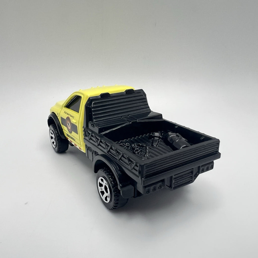 MATCHBOX 2023 CITY AVENTURE II - EXCLUSIVE 2016 RAM FLATBED YELLOW LOOSE