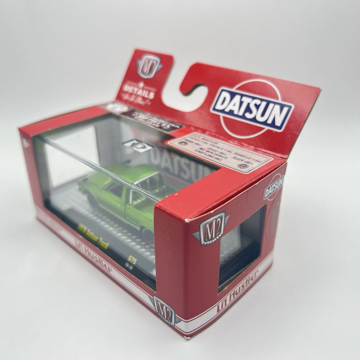 M2 Machines S75 Auto-Japan Li'l Hustler 1976 Datsun Truck 19-70 Green 1:64