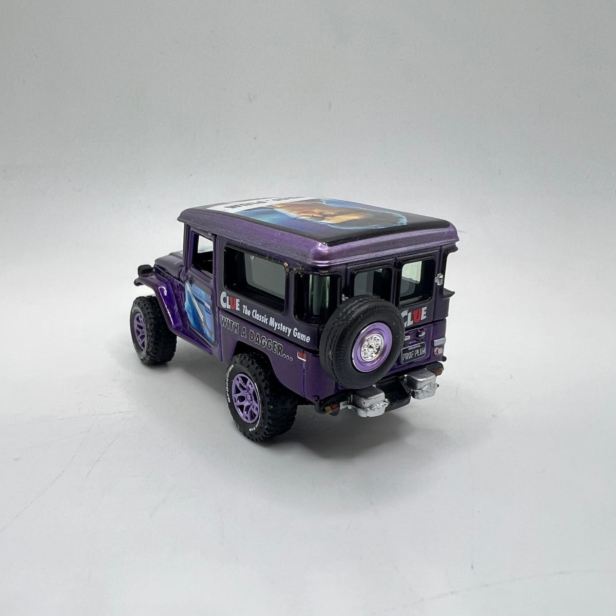Johnny Lightning Clue Toyota Land Cruiser FJ40 Prof Plum Purple LOOSE 1/64