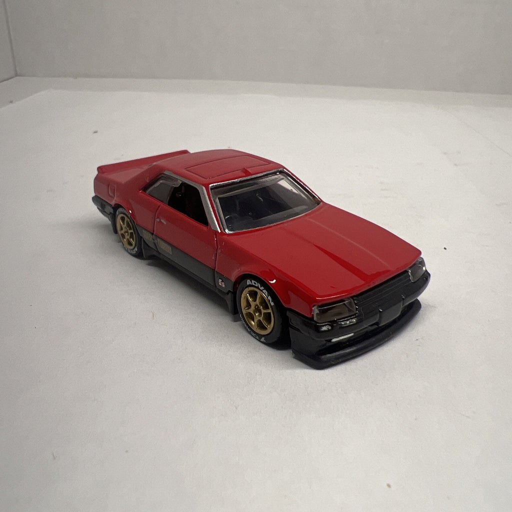 Hot Wheels 1:64 Red 1982 NISSAN SKYLINE R30 Custom with Real Riders