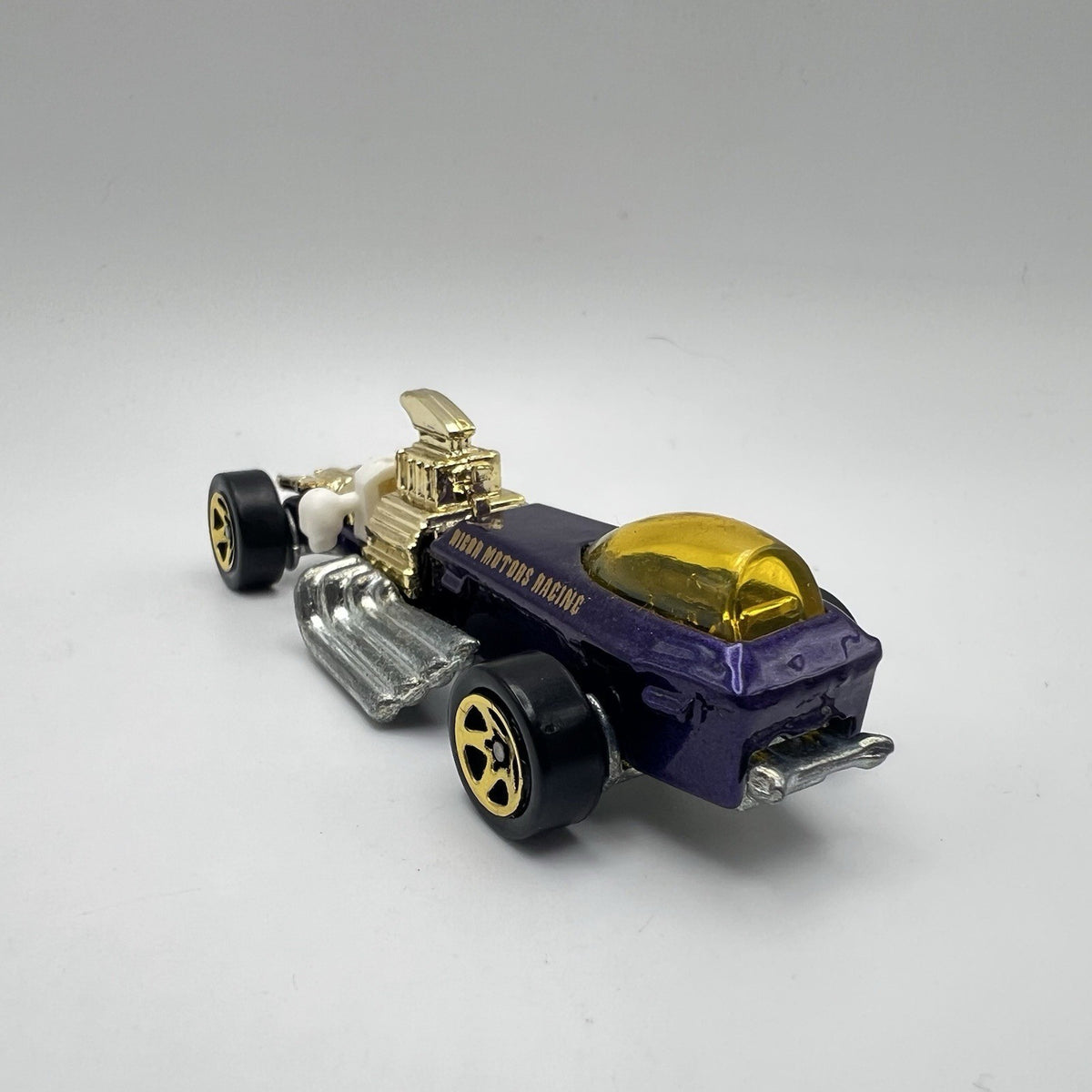 Vtg. 1994 Hot Wheels  Rigor Motor Racing Car Purple Gold 1:64 Die-cast