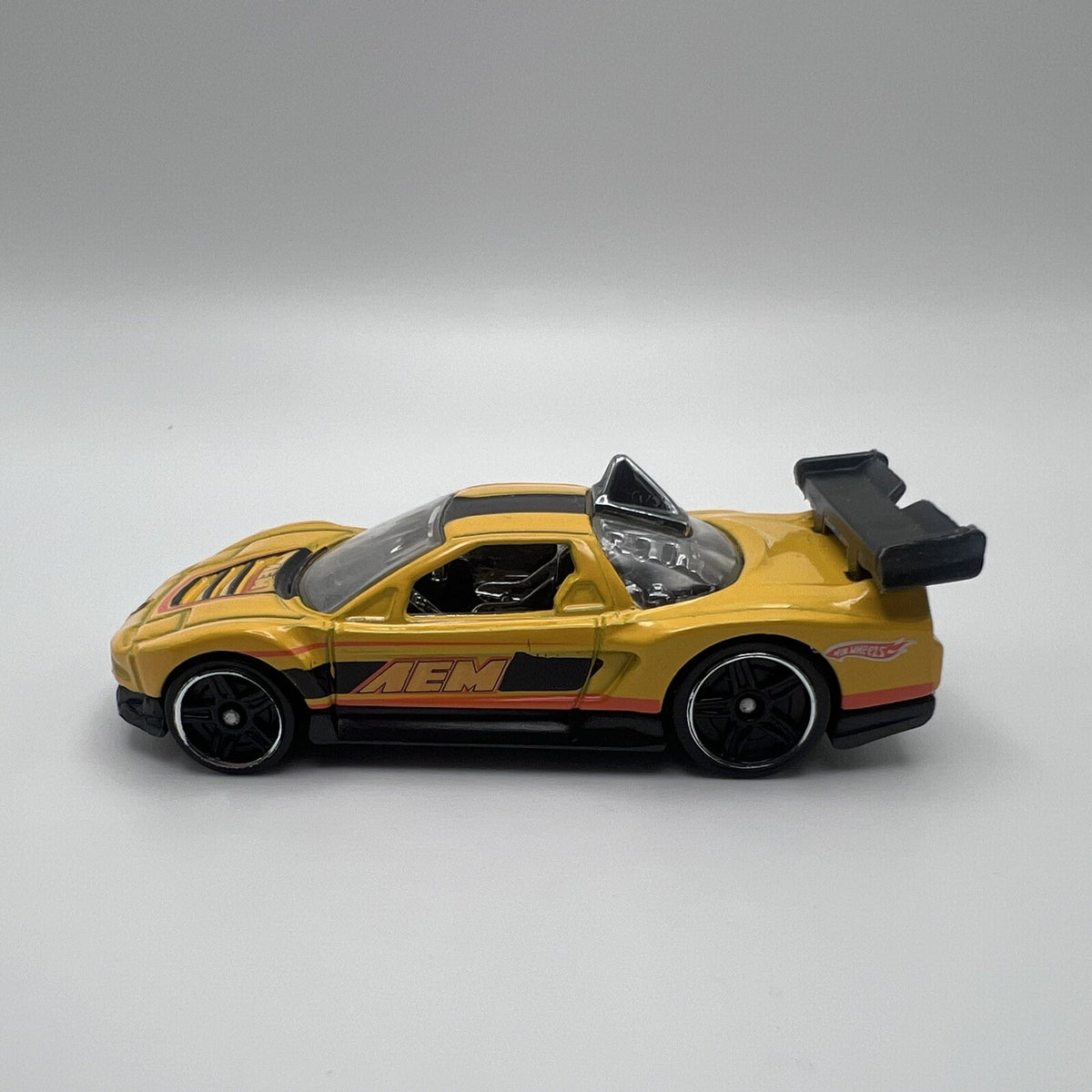 2010 HOT WHEELS ACURA NSX AEM YELLOW 1:64 DIECAST 2 7/8" CAR W/ ORANGE & BLACK