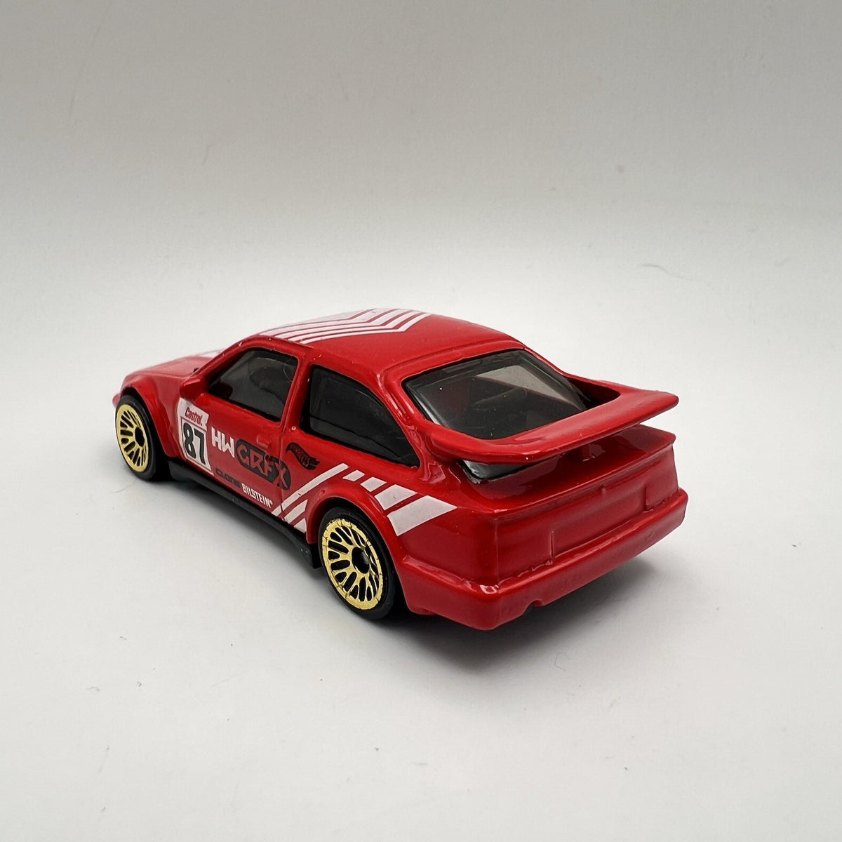 2022 HOT WHEELS '87 FORD SIERRA COSWORTH #87 RED DIECAST 2 7/8" RACE CAR W WHITE