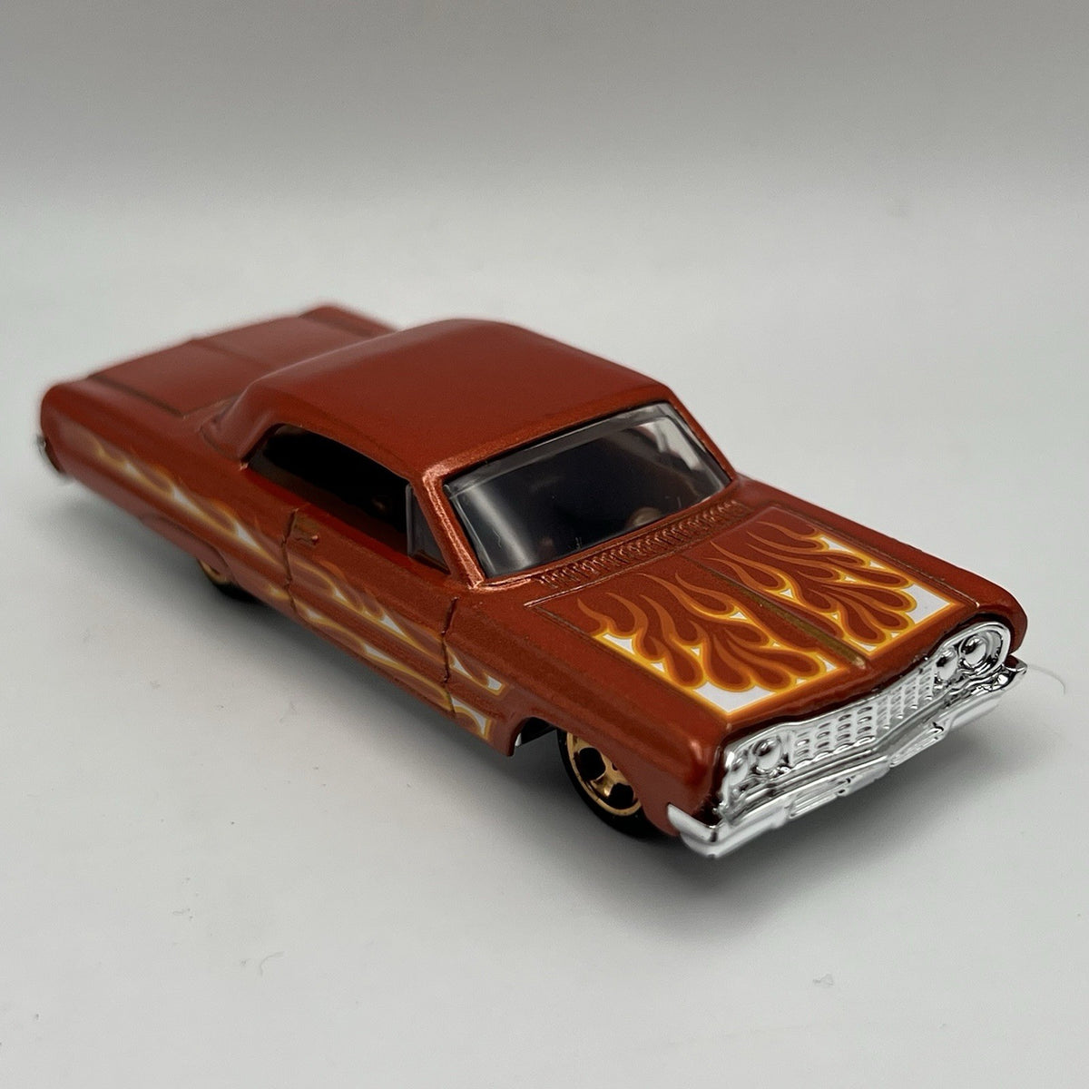 '64 Impala Hot Wheels 2024 Flames Series Metalflake Orange RSW Rims 1:64 Loose