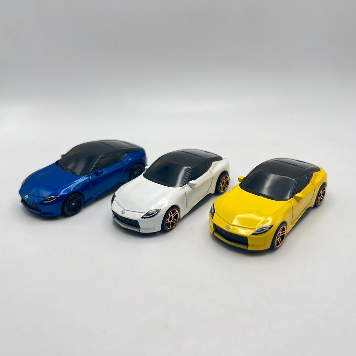 Hot Wheels Nissan Z Proto Lot of 3 Blue White Yellow LOOSE 1/64