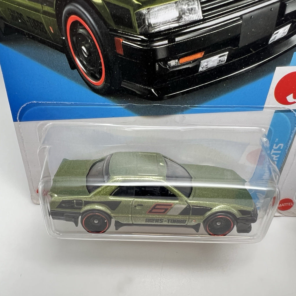 Lot of 2 - purple & green 2024 Hot Wheels Nissan Skyline RS KDR30 J-Imports jdm