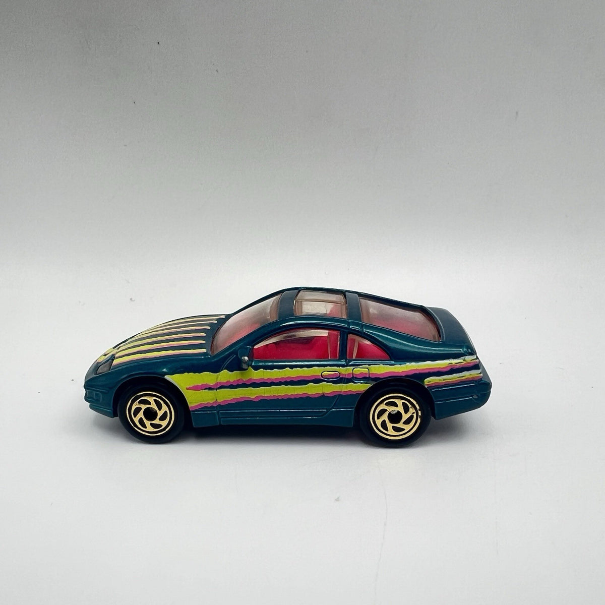 Matchbox 1993 Super-Fast NISSAN 300-ZX #61 Aqua with Pink Interior