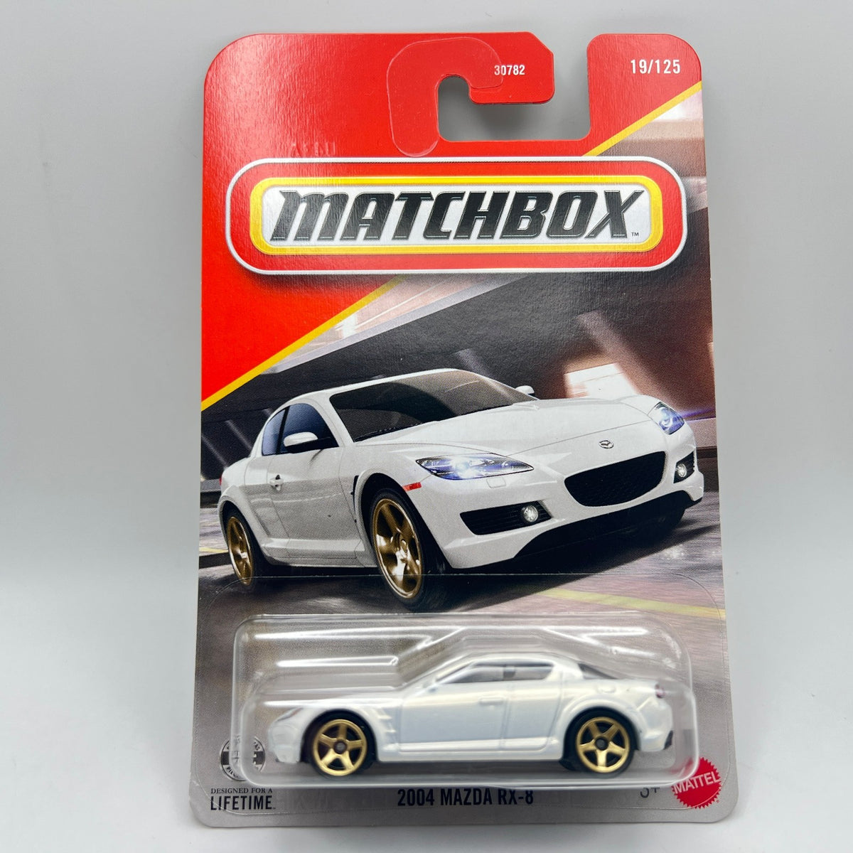 Matchbox 2004 Mazda RX-8 19/125 Silver White Gold Wheels 1:64 Diecast