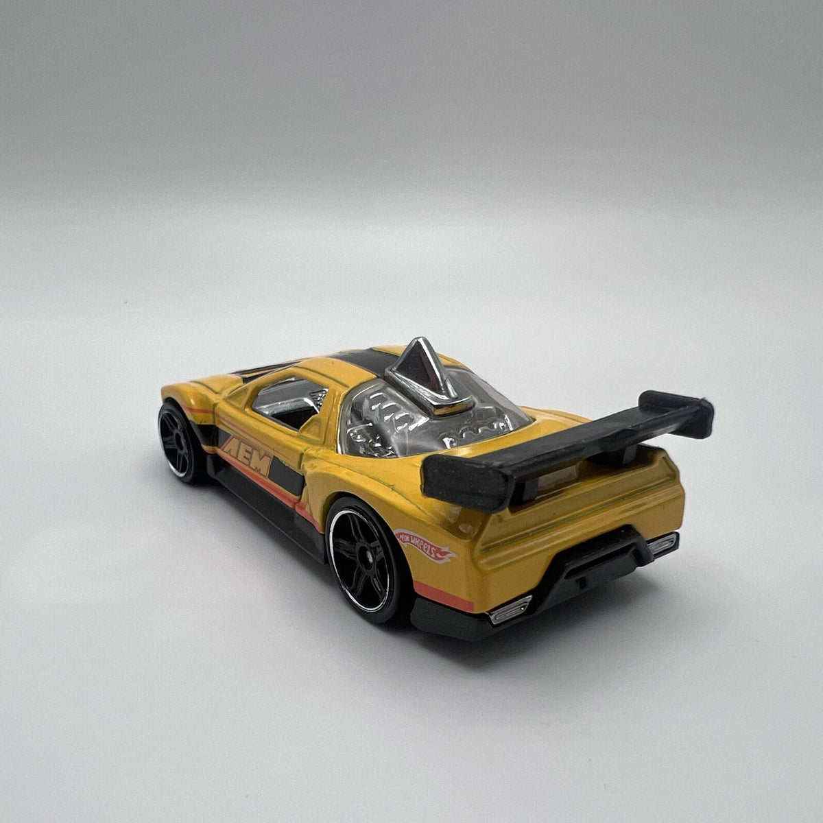 2010 HOT WHEELS ACURA NSX AEM YELLOW 1:64 DIECAST 2 7/8" CAR W/ ORANGE & BLACK