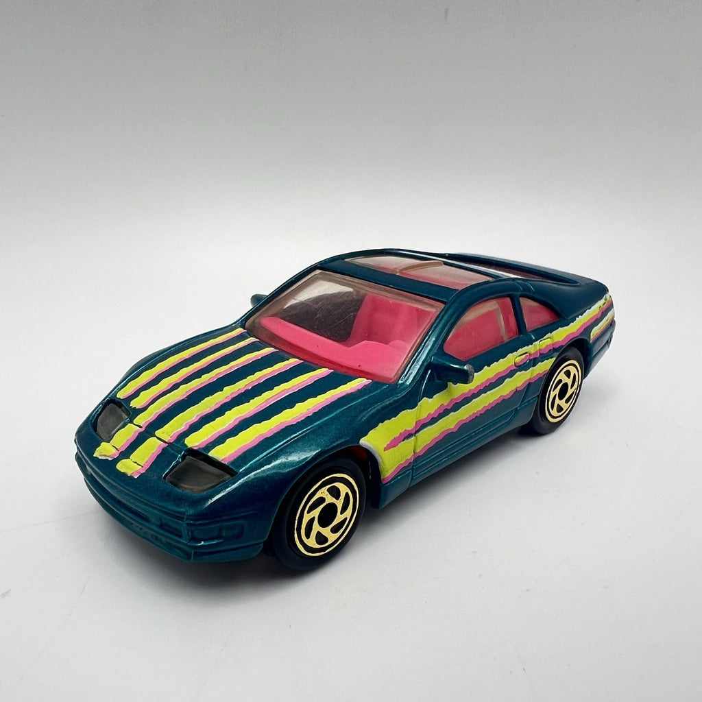 Matchbox 1993 Super-Fast NISSAN 300-ZX #61 Aqua with Pink Interior