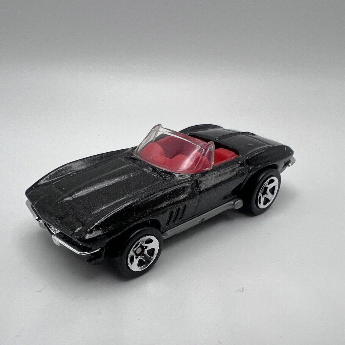 VTG Hot Wheels ‘65 Corvette GMTM Black W/Red Interior Malaysia-1999 M.I.