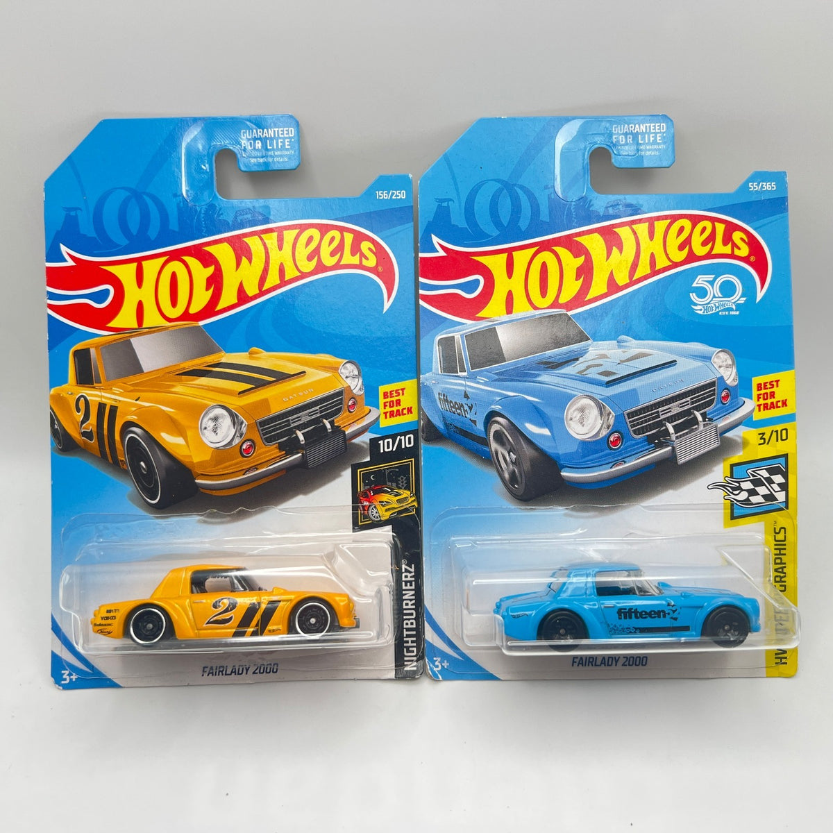 Hot Wheels Fairlady 2000 Lot of 2 Yellow 156/250 + Blue 55/365 Speed Graphics