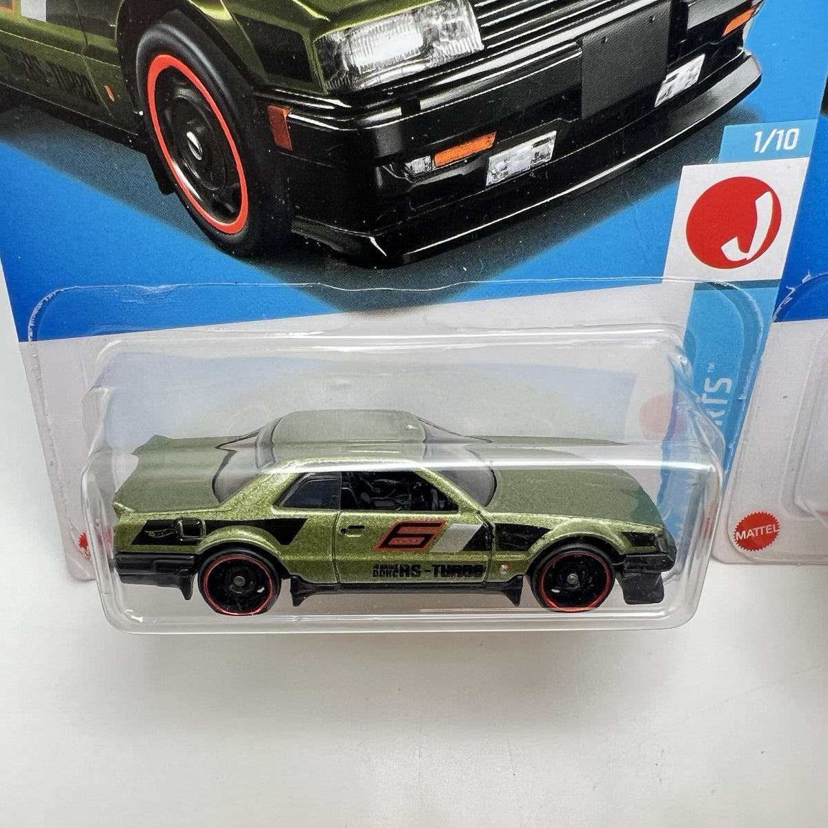 Lot of 2 - purple & green 2024 Hot Wheels Nissan Skyline RS KDR30 J-Imports jdm