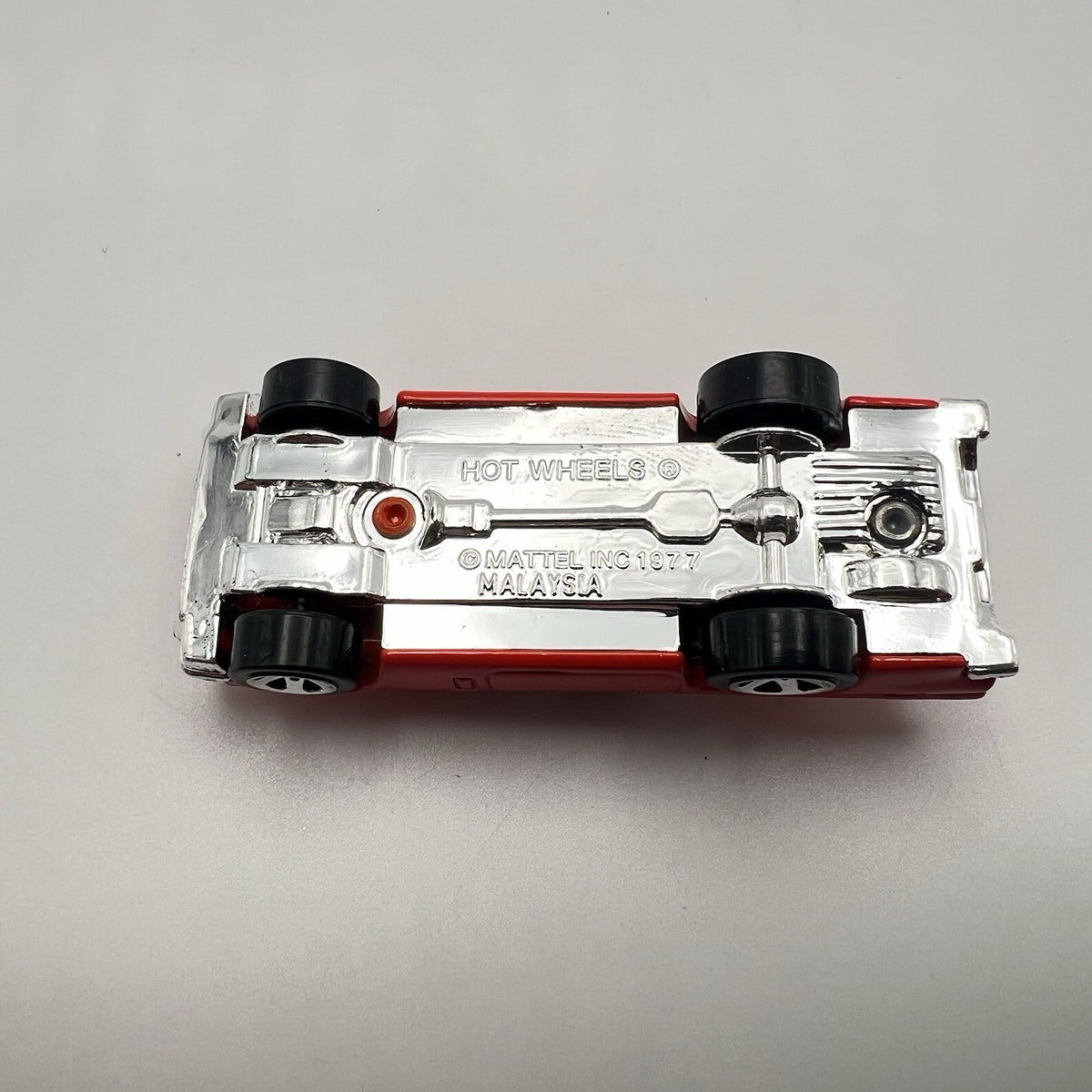 hot wheels 57 thunderbird In Orange With White Top.