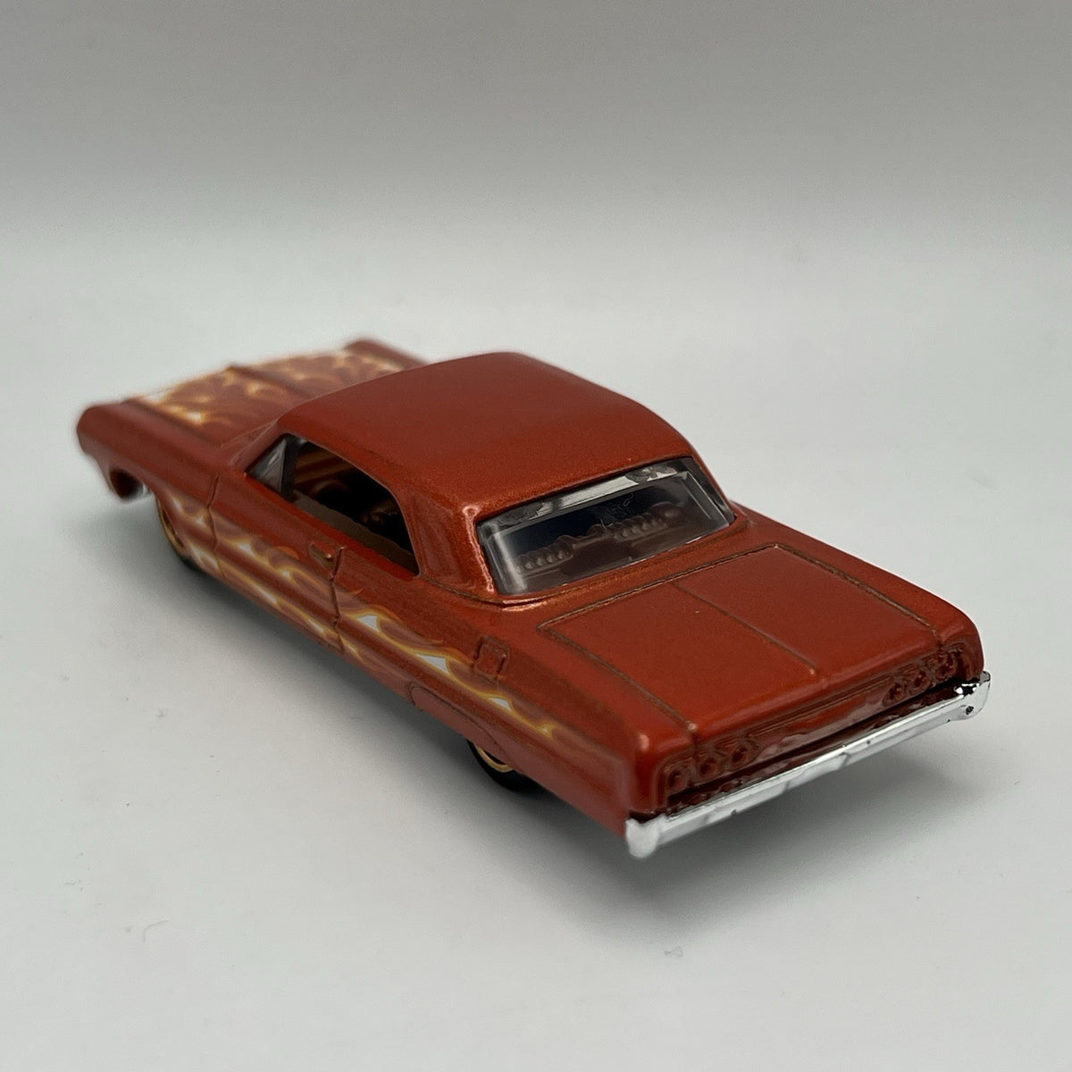 '64 Impala Hot Wheels 2024 Flames Series Metalflake Orange RSW Rims 1:64 Loose