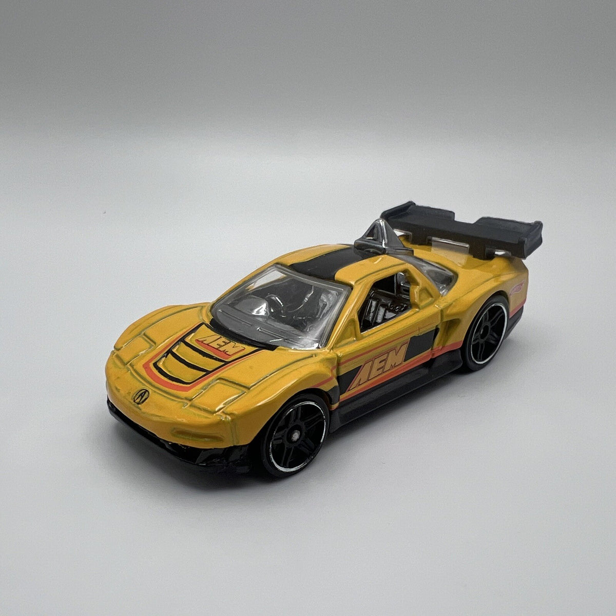 2010 HOT WHEELS ACURA NSX AEM YELLOW 1:64 DIECAST 2 7/8" CAR W/ ORANGE & BLACK