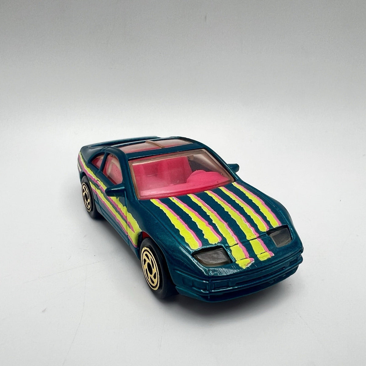 Matchbox 1993 Super-Fast NISSAN 300-ZX #61 Aqua with Pink Interior