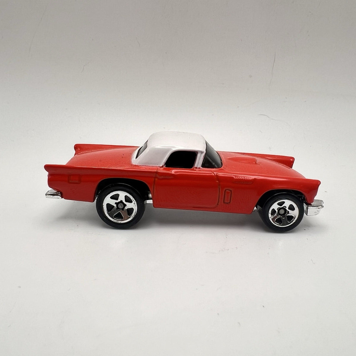 hot wheels 57 thunderbird In Orange With White Top.