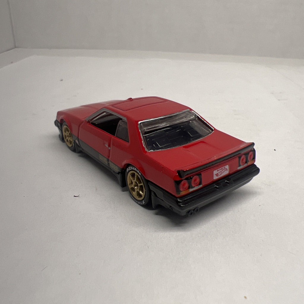 Hot Wheels 1:64 Red 1982 NISSAN SKYLINE R30 Custom with Real Riders