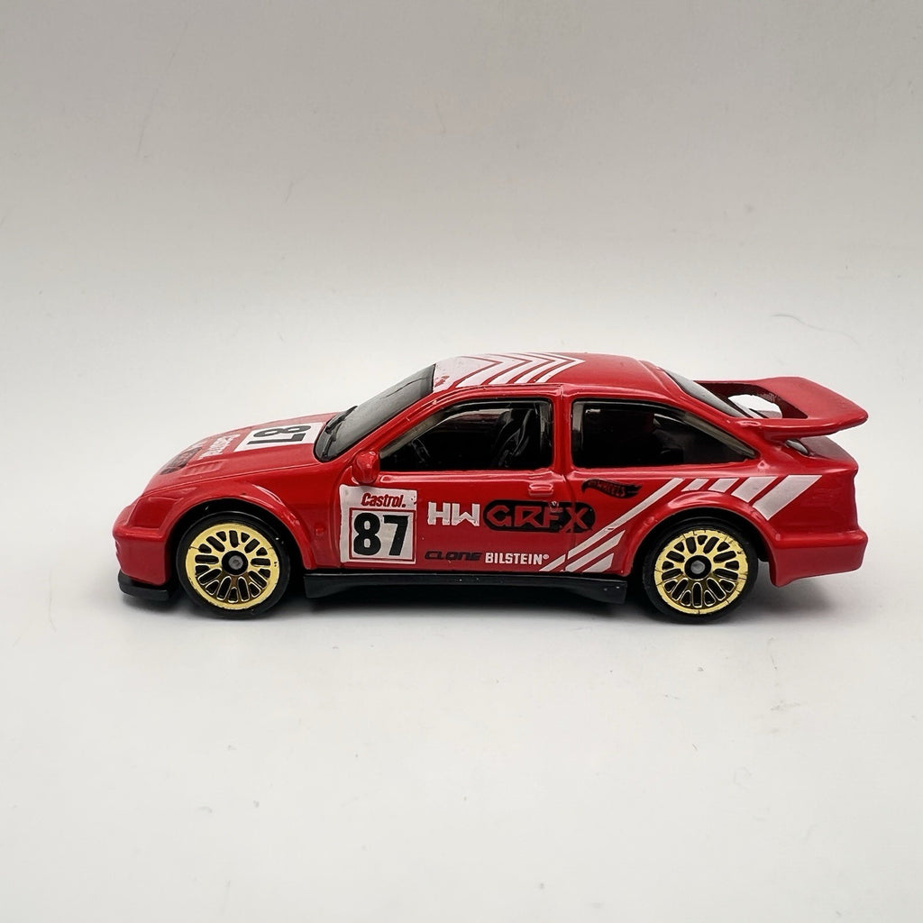 2022 HOT WHEELS '87 FORD SIERRA COSWORTH #87 RED DIECAST 2 7/8" RACE CAR W WHITE