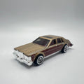 Hot Wheels Cadillac Seville Gold Maroon LOOSE 1/64