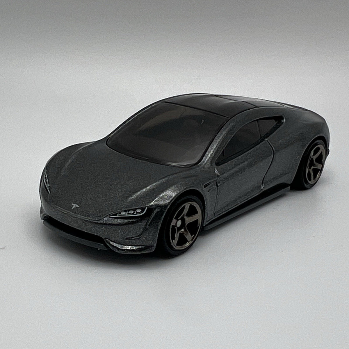 2022 Matchbox 75/100 2020 Tesla Roadster Concept Car Dark Gray Mtflk 1:64 NM