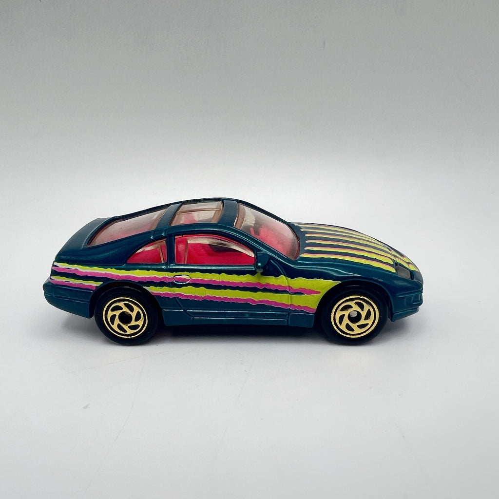 Matchbox 1993 Super-Fast NISSAN 300-ZX #61 Aqua with Pink Interior
