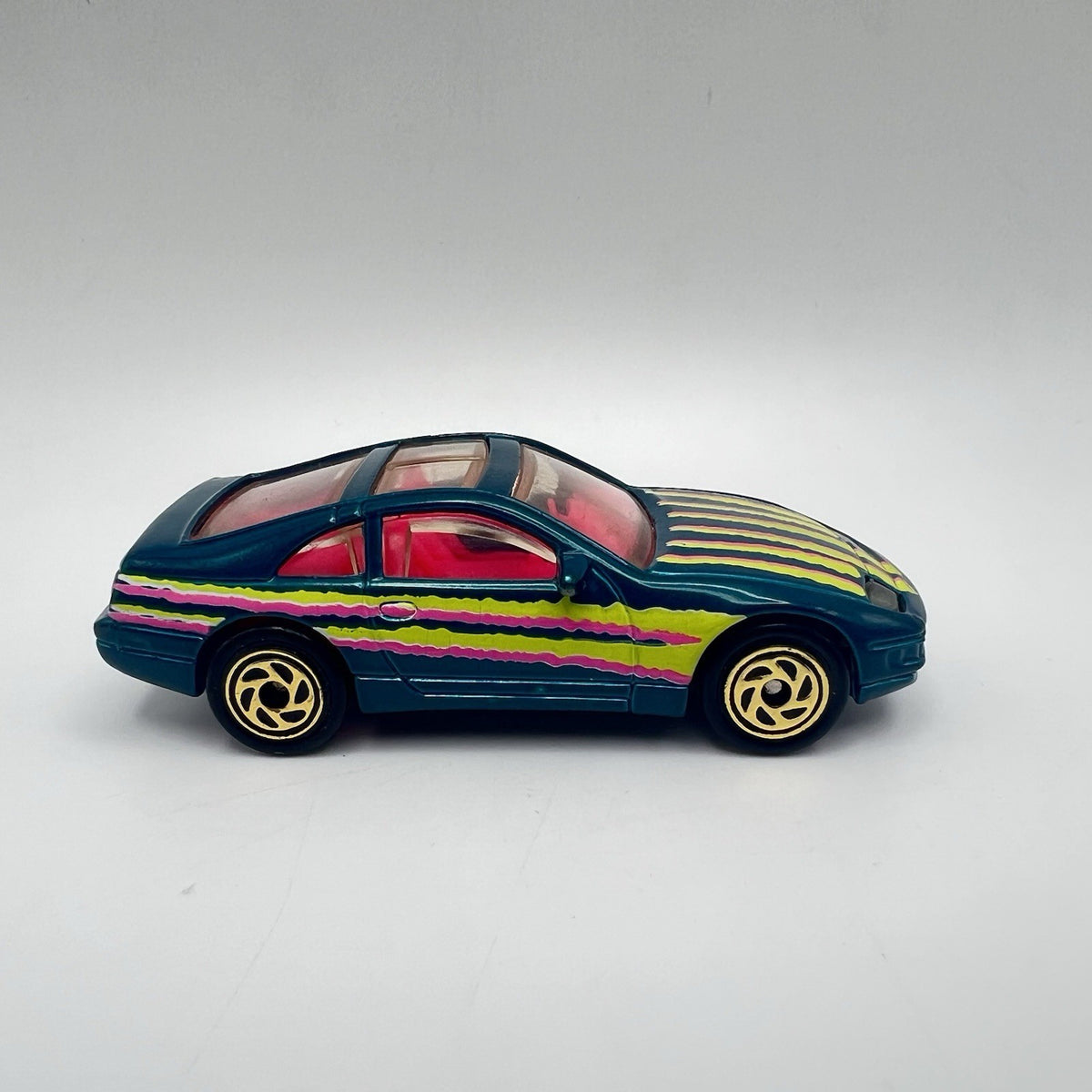 Matchbox 1993 Super-Fast NISSAN 300-ZX #61 Aqua with Pink Interior