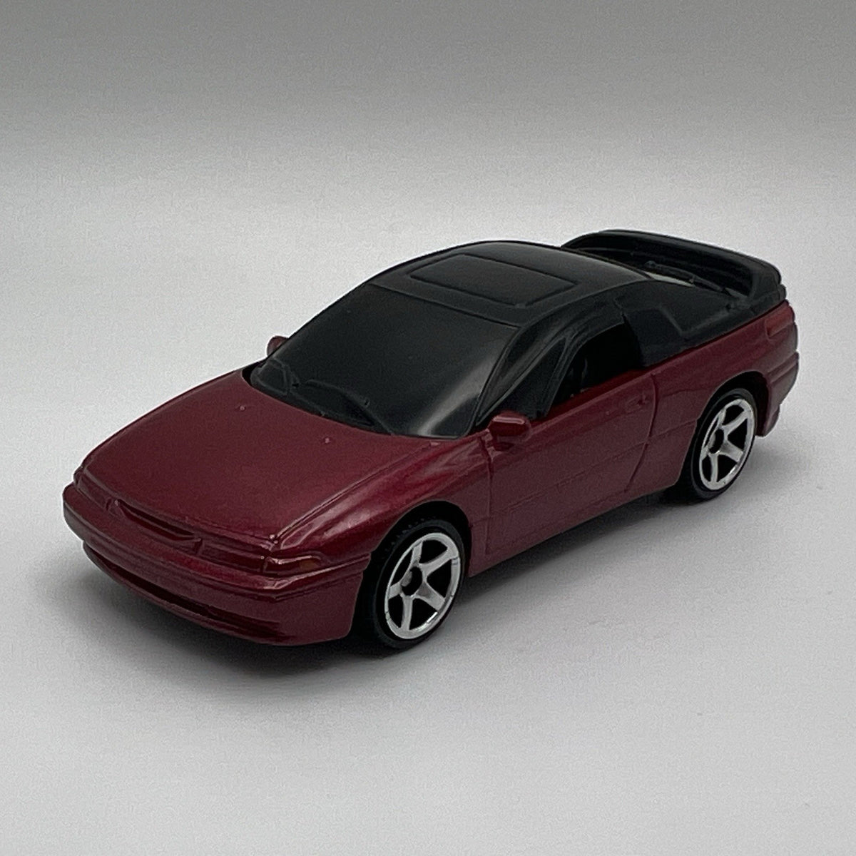 Matchbox Ryu Asada 88/100 Subaru SVX Coupe Dark Red Mtflk w/Silver 5 Spoke 1:64