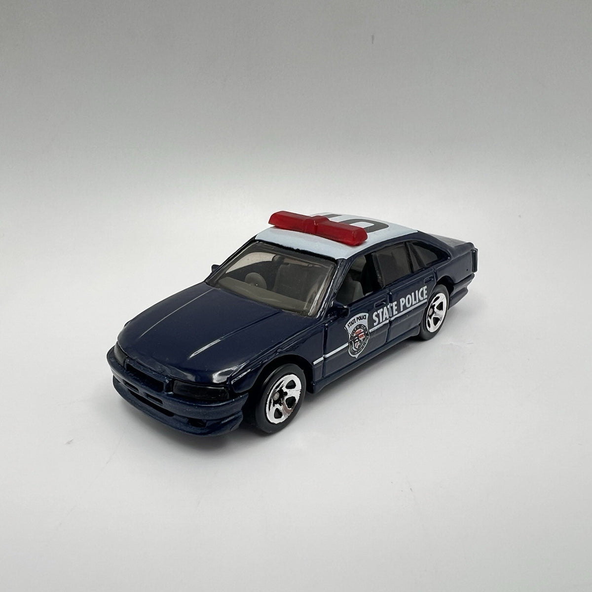 1997 Hot Wheels Blue Holden Commodore State Police 1/64 Diecast/Plastic 5 Spokes