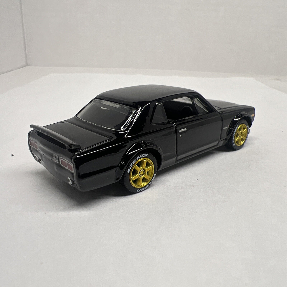 2014 HOT WHEELS NISSAN SKYLINE H/T 2000GT-X HW WORKSHOP  With Real Riders