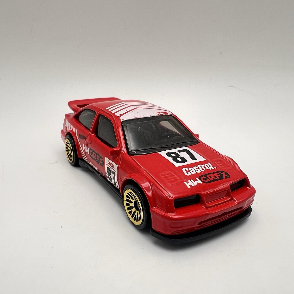 2022 HOT WHEELS '87 FORD SIERRA COSWORTH #87 RED DIECAST 2 7/8" RACE CAR W WHITE