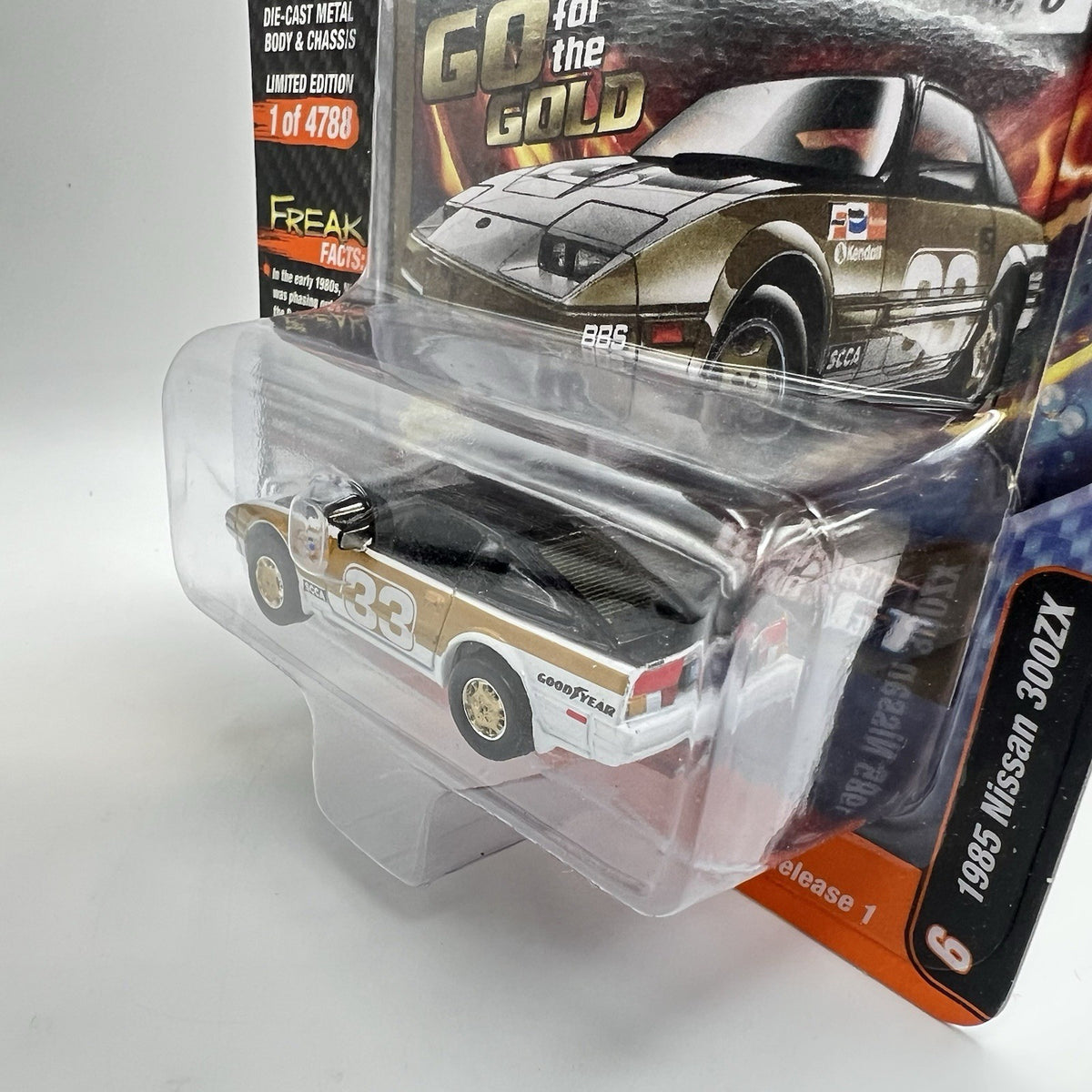 JOHNNY LIGHTNING IMPORT HEAT GT 1985 NISSAN 300ZX #33 RACE CAR GOLD/BLACK 1/64