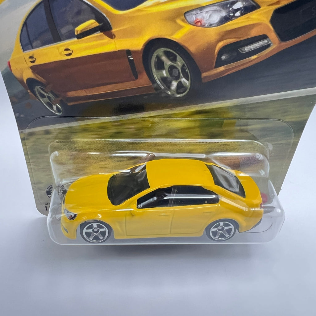 Matchbox Holden VF Commodore SSV Yellow 84/125 2026 Mainline 1:64 Diecast